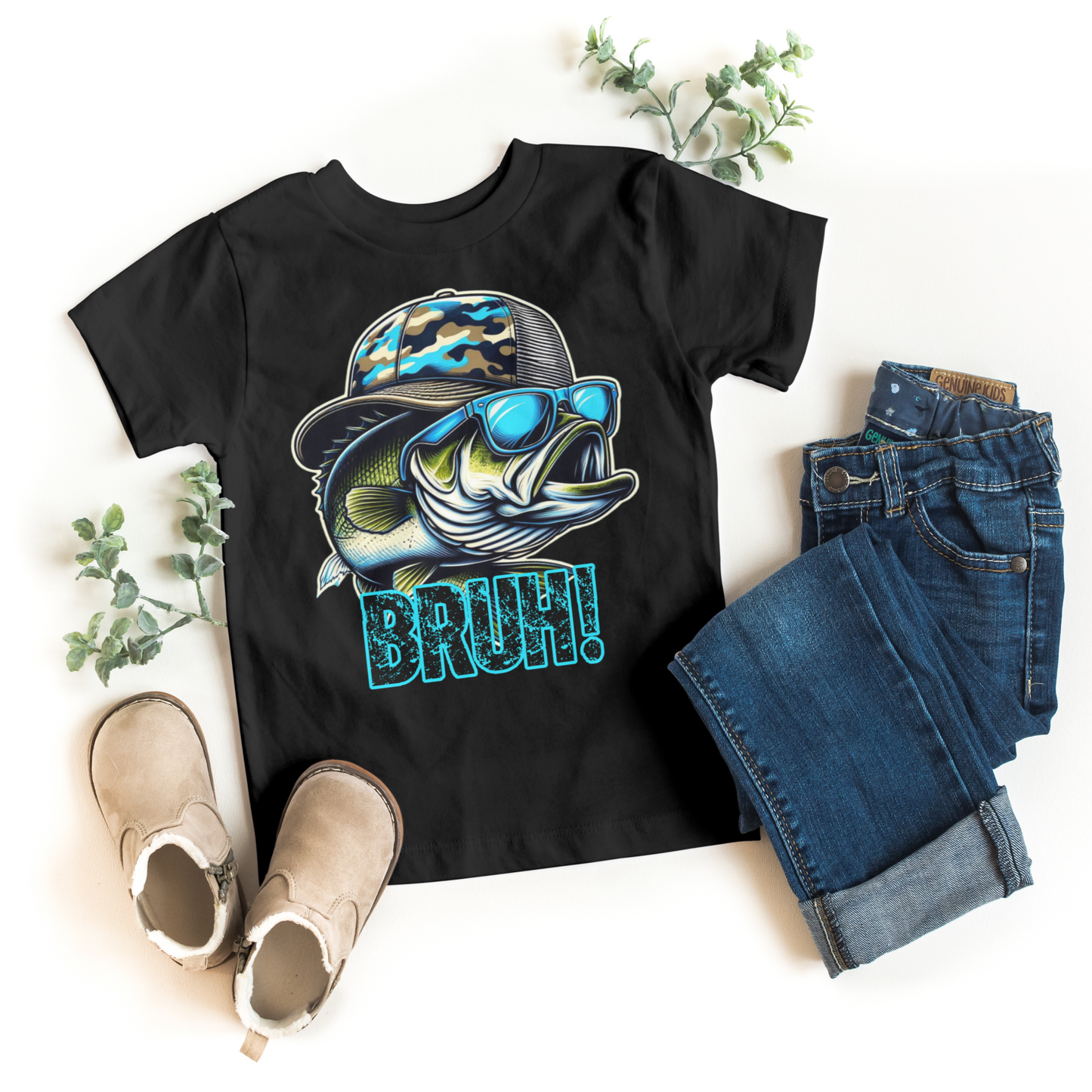 Black t-shirt with fish graphic and 'BRUH!' text, paired with jeans and shoes on a white background.