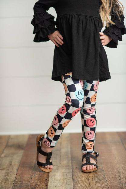 Kids Black & White Check Smiley Face Ruffle Top Leggings Set