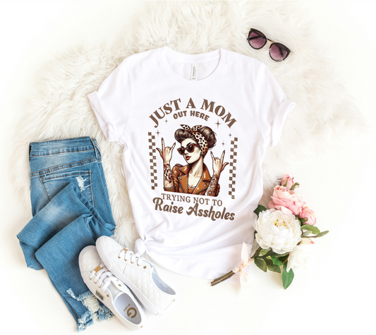 Just a Mom Out Here Tee "Trying Not to Raise Aholes"**